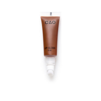 Clear squeeze out lipgloss tube no top, cotton like lip applicator, filled with lipgloss product in the shade "Cocoa"