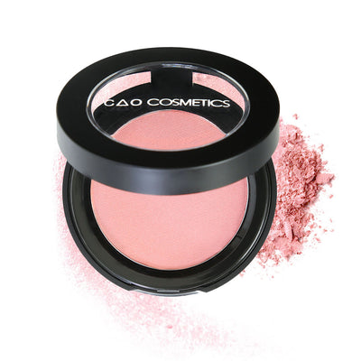 Round Matte Black Component, clear round top window, filled with compressed round powder blush shade in "American Beauty" on top of loose powder swatch.