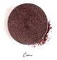 a dark burgundy colored individual eyeshadow compressed powder refill in shade "cosmo"