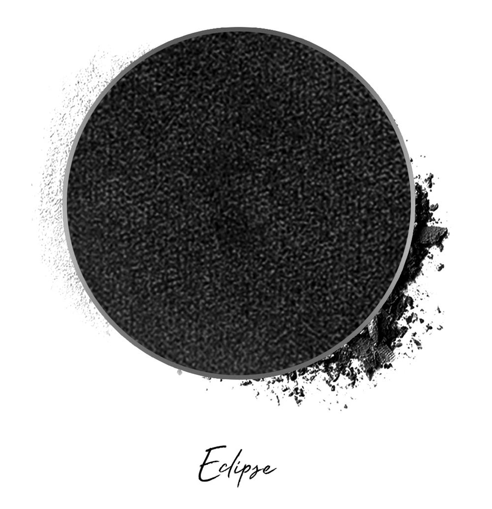 a black individual eyeshadow compressed powder refill in shade "eclipse"