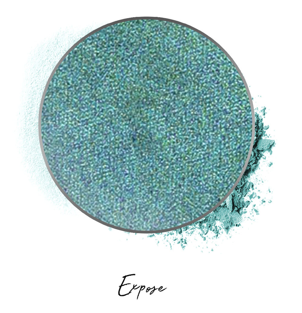 a light green individual eyeshadow compressed powder refill in shade "expose"