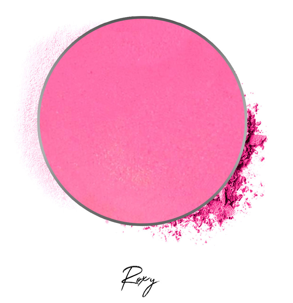 a bright pink individual eyeshadow compressed powder refill in shade "roxy"