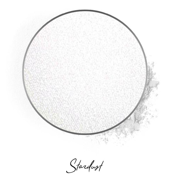 a white individual eyeshadow compressed powder refill in shade "stardust"